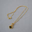 Black and White Heart Necklace in Gold