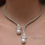 Elegant shiny necklace with pearls made of sterling silver